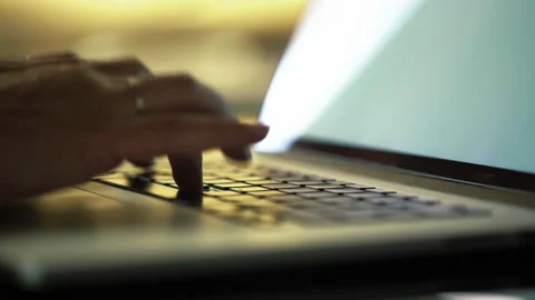 Close-up macro view of businessman or student typing on laptop computer keyboard Vidéo 168681879