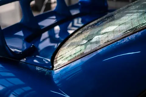 A close up macro view of car detailing process inside cleaning service workshop Stock Photos