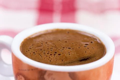 Close macro view of cup of coffee ballons Stock-Fotos