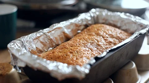 Close-up macro view of freshly baked homemade nut cupcake bread with sunshine on Stock Footage 129220286