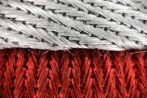 A close up macro view of red and white fabric texture Stock Photos