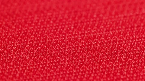 Close-up macro view of red velcro surface with micro hooks Stock Footage 173490839