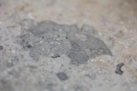 Close up macro view of rough grey stone granite surface detailed nature mar.. Stock Photos