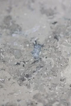 Close up macro view of rough grey stone granite surface detailed nature mar.. Stock Photos