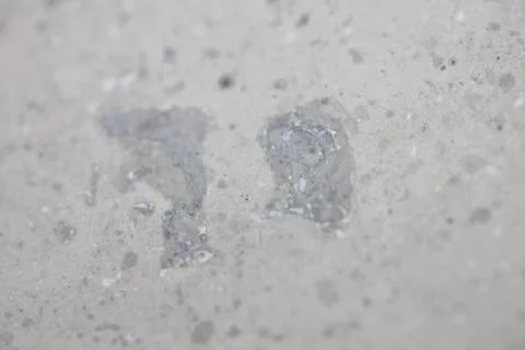 Close up macro view of rough grey stone granite surface detailed nature mar.. Stock Photos