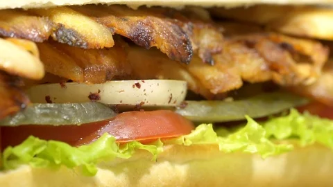Close up, macro view of Turkish fast food chicken doner kebab sandwich. Stock Footage 94641659