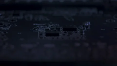Close-up Macro View of Video Card Microchip with RGB Lighting and Details Vidéo 301714031