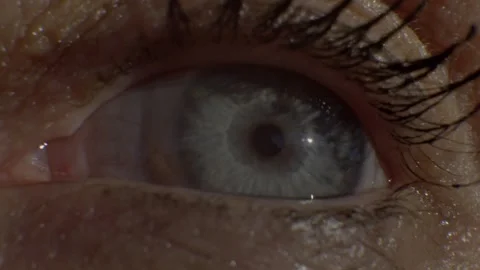 Close up macro woman's eye opens. Blue iris. Slow motion 4K 库存影片 274140079
