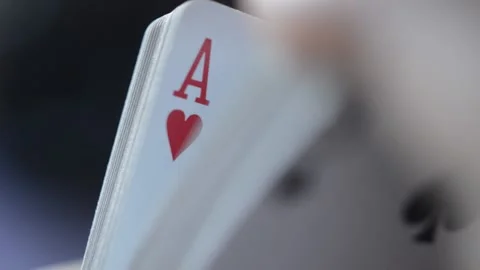 Close-up magician's hand using playing cards for some trick Video stock 204844073