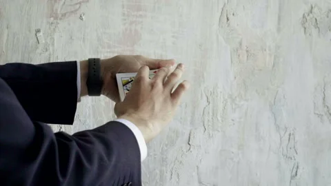 Close-up of magician's hands performing card trick. Slow motion. HD Stock Footage 96635804