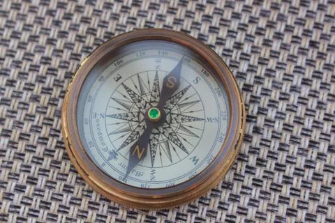 A close up of a magnetic compass Stock Photos