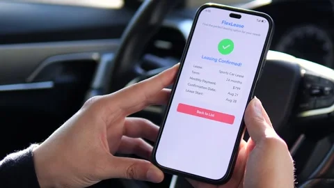 Close-up of a major milestone: a phone screen shows a congratulatory message for Stock Footage 315558259