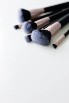 Close up of make up brushes over white background Stock Photos