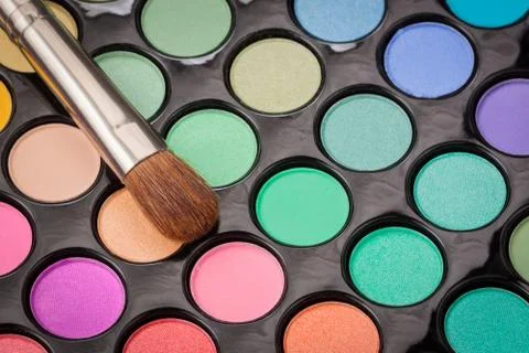 Close-up of make-up eye shadow palette with brush Stock Photos