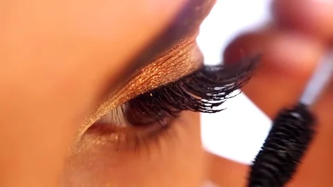 Close up of make up hazel eye with long lashes with black mascara. Stock-Footage 82709721