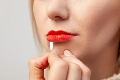 Close-up of the make-up of the lips of a model with a light-colored face, the Stock Photos