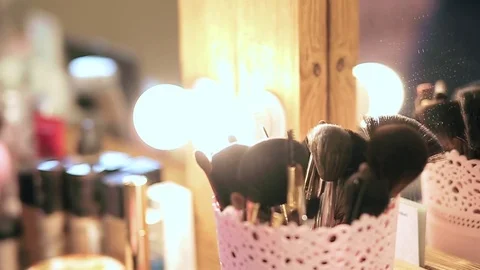 Close-up of make up table with professional makeup brush. Concept of a beauty Stock Footage 76081781