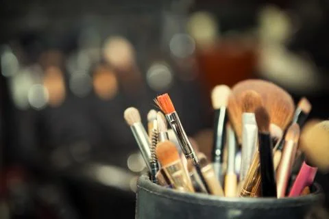 Close-up of make up table with professional makeup brush. Visagiste tools.Dif Stock Photos