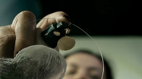 Close up of a makeup brush moving over mixing pallete 스톡 동영상 82073186