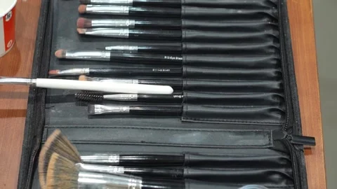 Close-Up of Makeup Brushes and Professional Cosmetic Tools Stock Footage 322060399