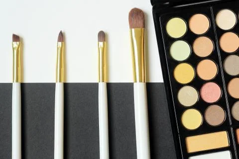 Close up. makeup brushes on black and white background Stock Photos
