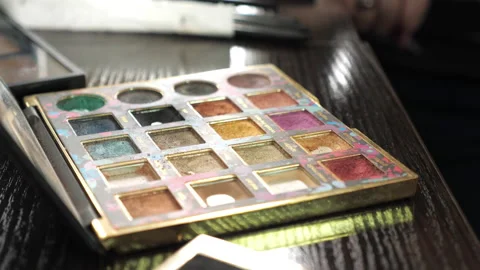 Close up makeup multicolored eyeshadow palette in a beauty salon Stock Footage 133802224