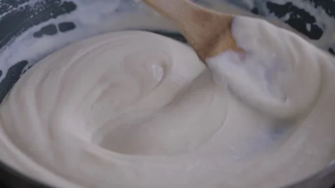 Close-up making béchamel sauce in pan Stock Footage 255007972