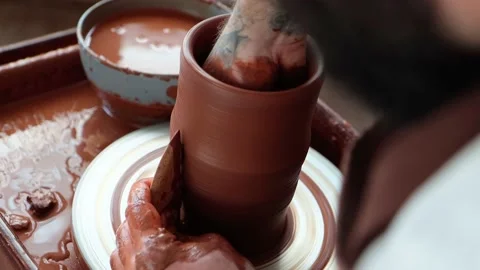 Close-up of making clay vase on potter's wheel, forming vase Stock Footage 201285993