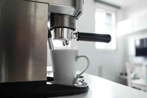 Close-up of making coffee in a coffee machine. Stock Photos