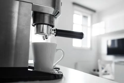 Close-up of making coffee in a coffee machine. Stock Photos