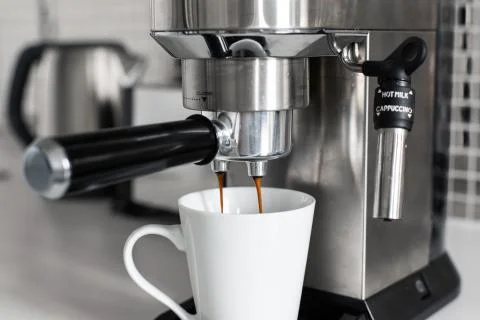 Close-up of making coffee in a coffee machine. Stock Photos