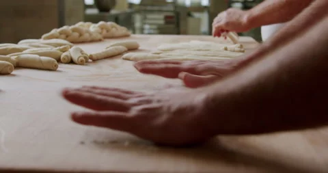 Close-up of making pastries at a bakery 4K. Stockbeeldmateriaal 221562795
