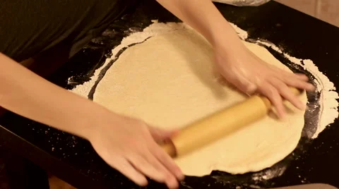 Close up making pizza in home kitchen for hobby. Video stock 60390148