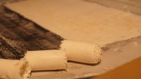 Close-up of Making Rolled Ice Cream on a Cold Plate Pan 스톡 동영상 345293088