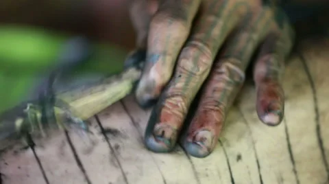 Close up of the making of a traditional Mentawai tattoo Stock Footage