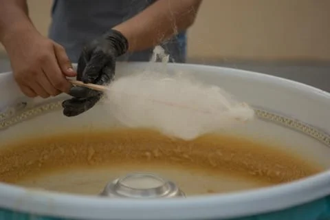 Close - up of making white cotton candy Stock Photos