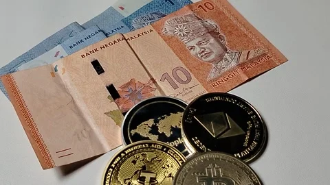 Close-up of Malaysian 1 Ringgit and 10 Ringgit banknotes with illustrations  Stock Footage 335643809