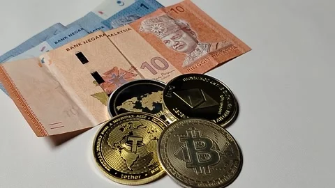 Close-up of Malaysian 1 Ringgit and 10 Ringgit banknotes with illustrations  Stock Footage 335643810