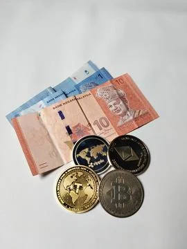 Close-up of Malaysian 1 Ringgit and 10 Ringgit banknotes with illustrations  Fotos de archivo