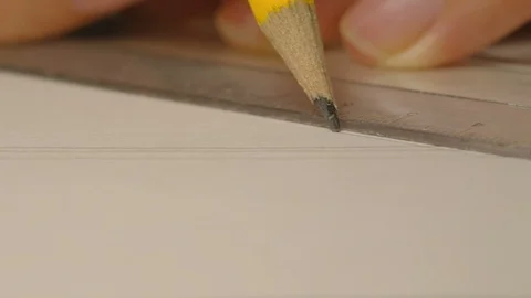 Close-up of male architect hands drawing a line on white paperboard. Stock Footage 97155281