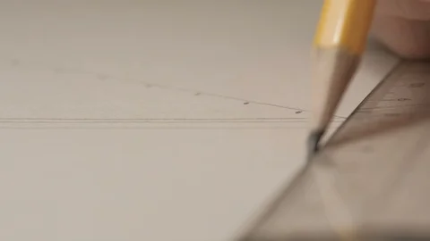 Close-up of male architect hands drawing a line on white paperboard. Stock Footage 97176737