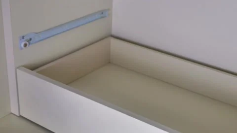 Close up of male carpenter hands assembling furniture cupboard and installing Stock Footage 148392899