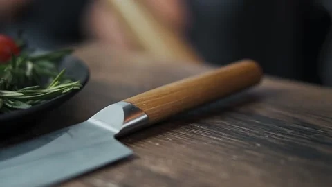 Close Up Of Male Chef Hand Taking Knife At Restaurant Kitchen, Only hands Video stock 154558199