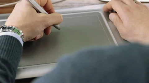 Close up of a male designer using a drawing tablet Stock Footage 59855790