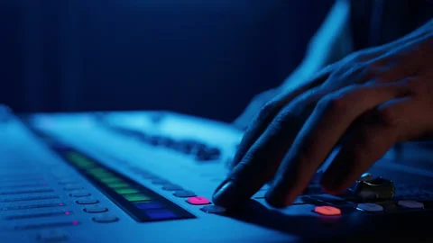 Close-up of a male DJ's hands during equipment setup Stock Footage 203809476