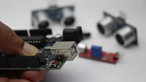 Close-up of a male engineer demonstrating micro controller board Stock Footage 158194034