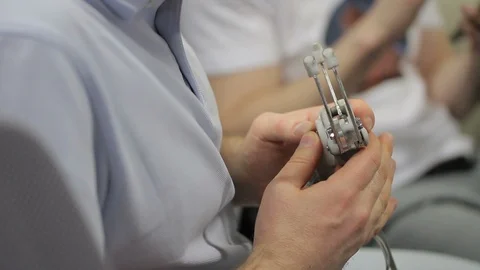 Close up of male engineer program project testing construction for robot bionic Stock Footage 94408211