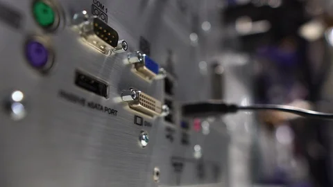 Close-up of male engineers are connected to cable systems of communication 動画素材 120071930
