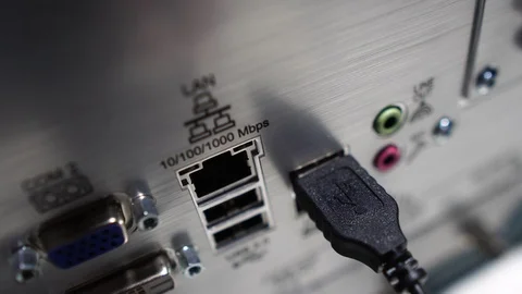 Close-up of male engineers are connected to cable systems of communication Stock Footage 120072052