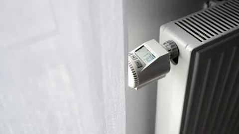 Close up on male hand adjusting temperature Stock Footage 76530516